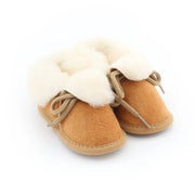 Chaussons bébé beige en peau de mouton