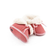 Chaussons bébé rose en peau de mouton