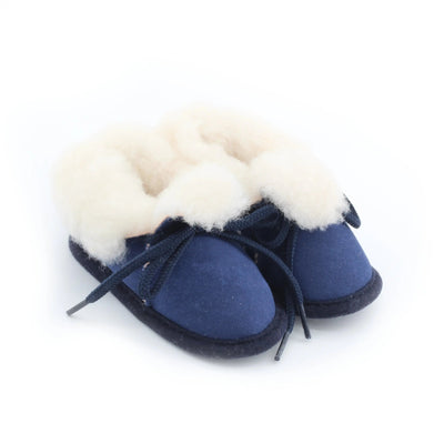 Chaussons bébé bleu en peau de mouton